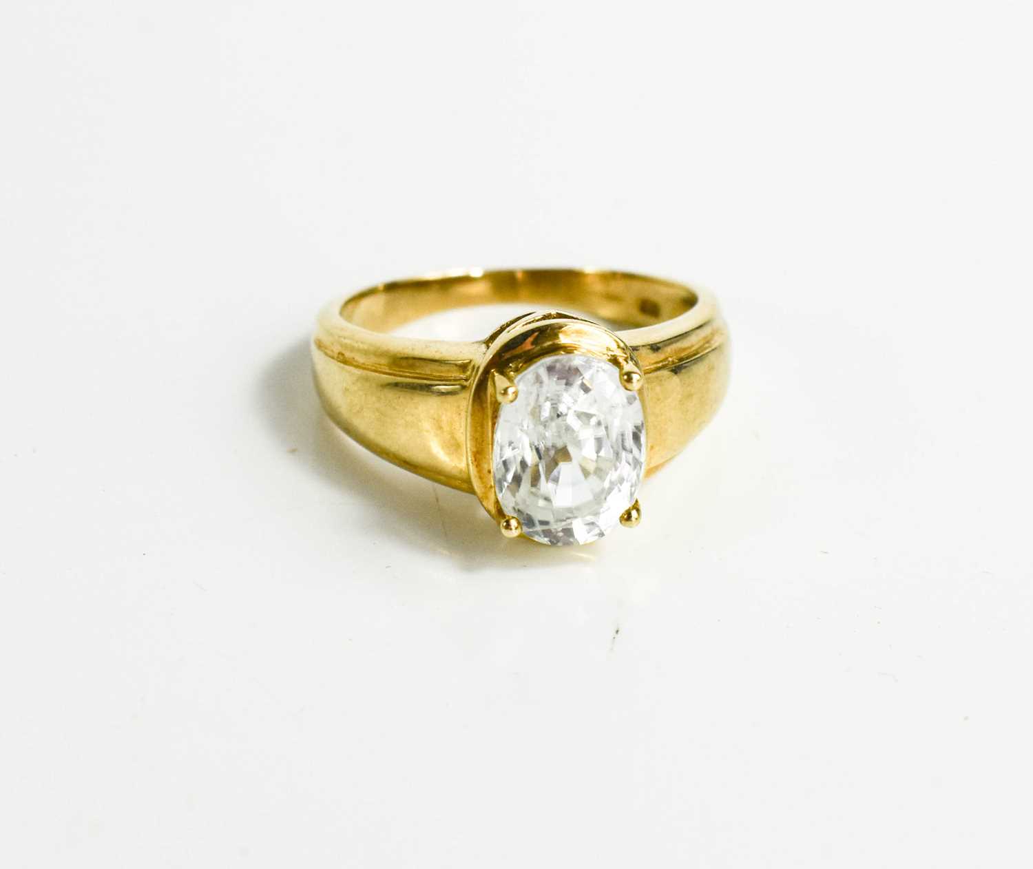 Lot 95 - A 9ct gold and oval paste ring, possibly cubic...