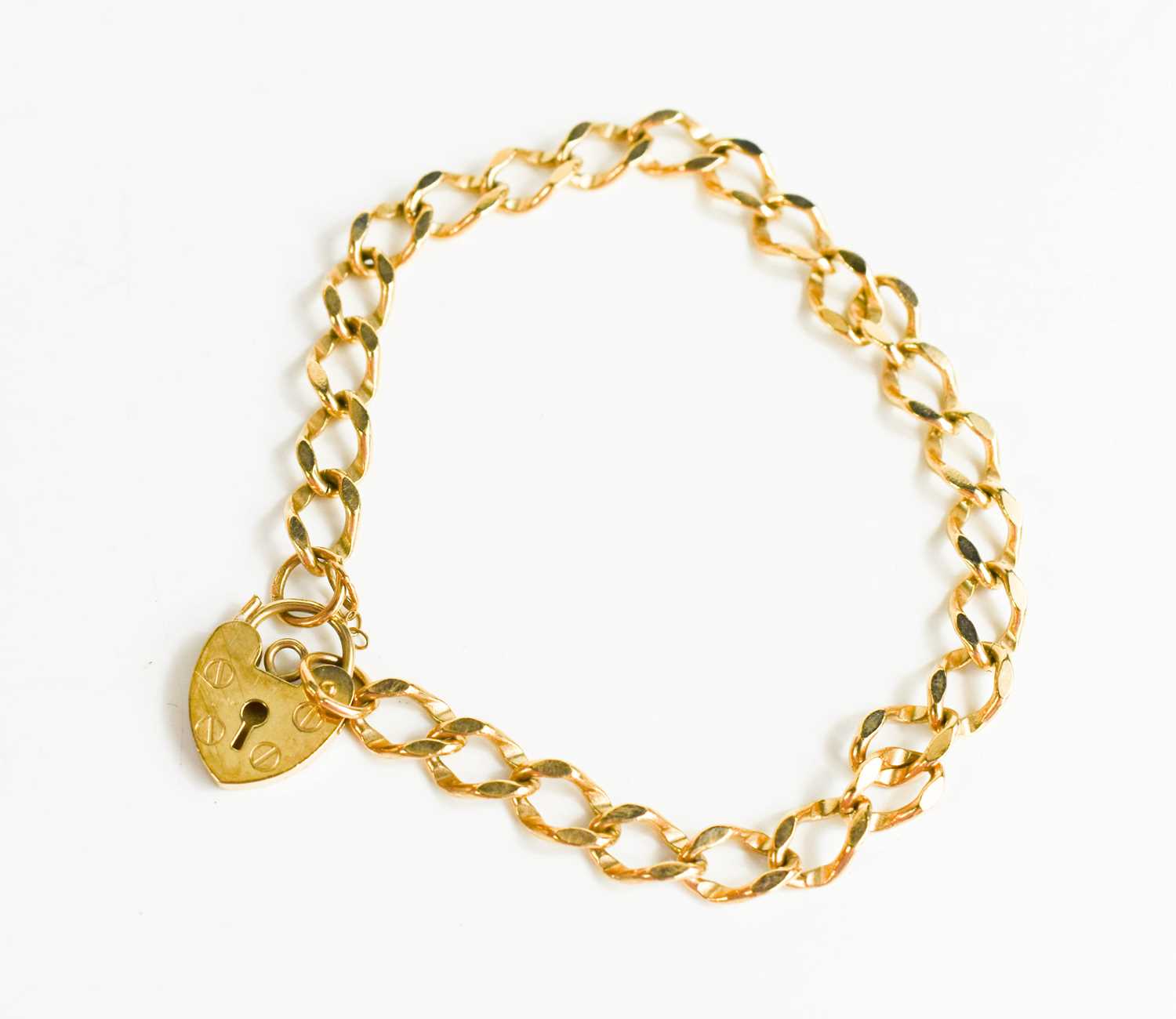 Lot 127 - A 9ct gold chain link bracelet, with heart...