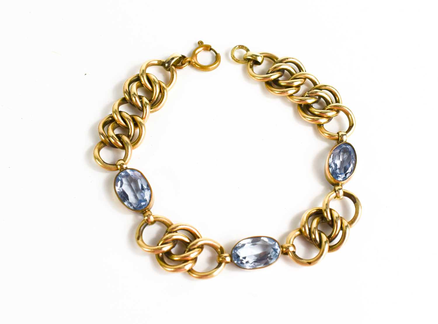 Lot 122 - An 18ct gold [tested as] and aquamarine chain...