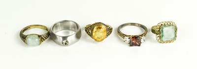 Lot 248 - A group of five gem set rings, some silver,...