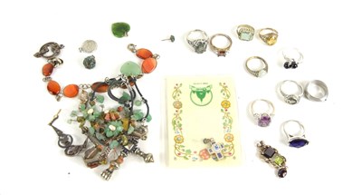 Lot 248 - A group of five gem set rings, some silver,...