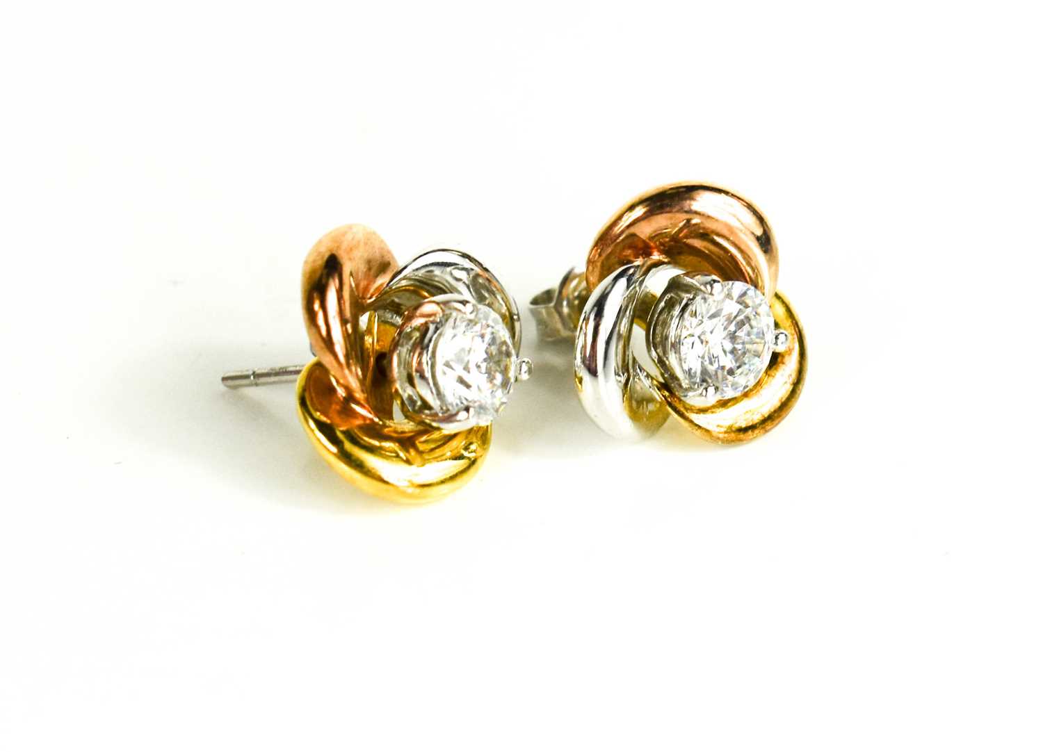 Lot 192 - A pair of 9ct white, yellow and rose gold...