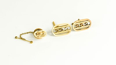 Lot 196 - A pair of 9ct gold cufflinks, and matching...