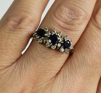 Lot 47 - An 18ct gold, diamond and sapphire ring, size...