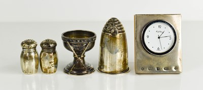 Lot 381 - A silver travelling salt and pepper, a Dunlop...