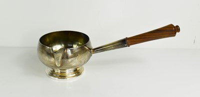 Lot 388 - A silver gravy ladle, with treen turned handle,...