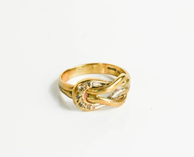 Lot 188 - A 9ct gold and diamond set knot ring, size I,...