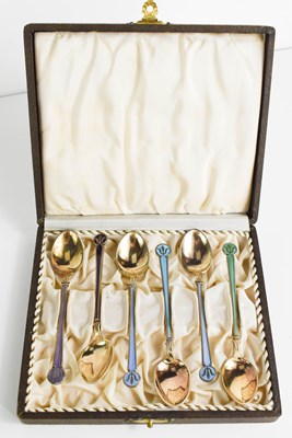 Lot 386 - A set of silver and enamelled tea spoons by...