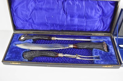 Lot 571 - A French Sabatier stainless steel carving set,...