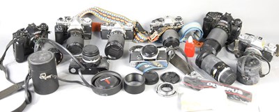 Lot 304 - A group of vintage Olympus 35mm cameras to...