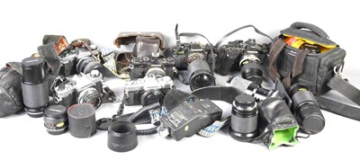 Lot 305 - A group of vintage Olympus 35mm cameras to...