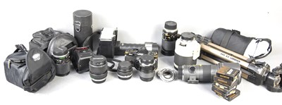 Lot 302 - An Olympus OM4 35mm camera with various lenses...