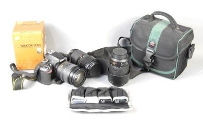 Lot 301 - A Nikon D3200 SLR digital camera with various...