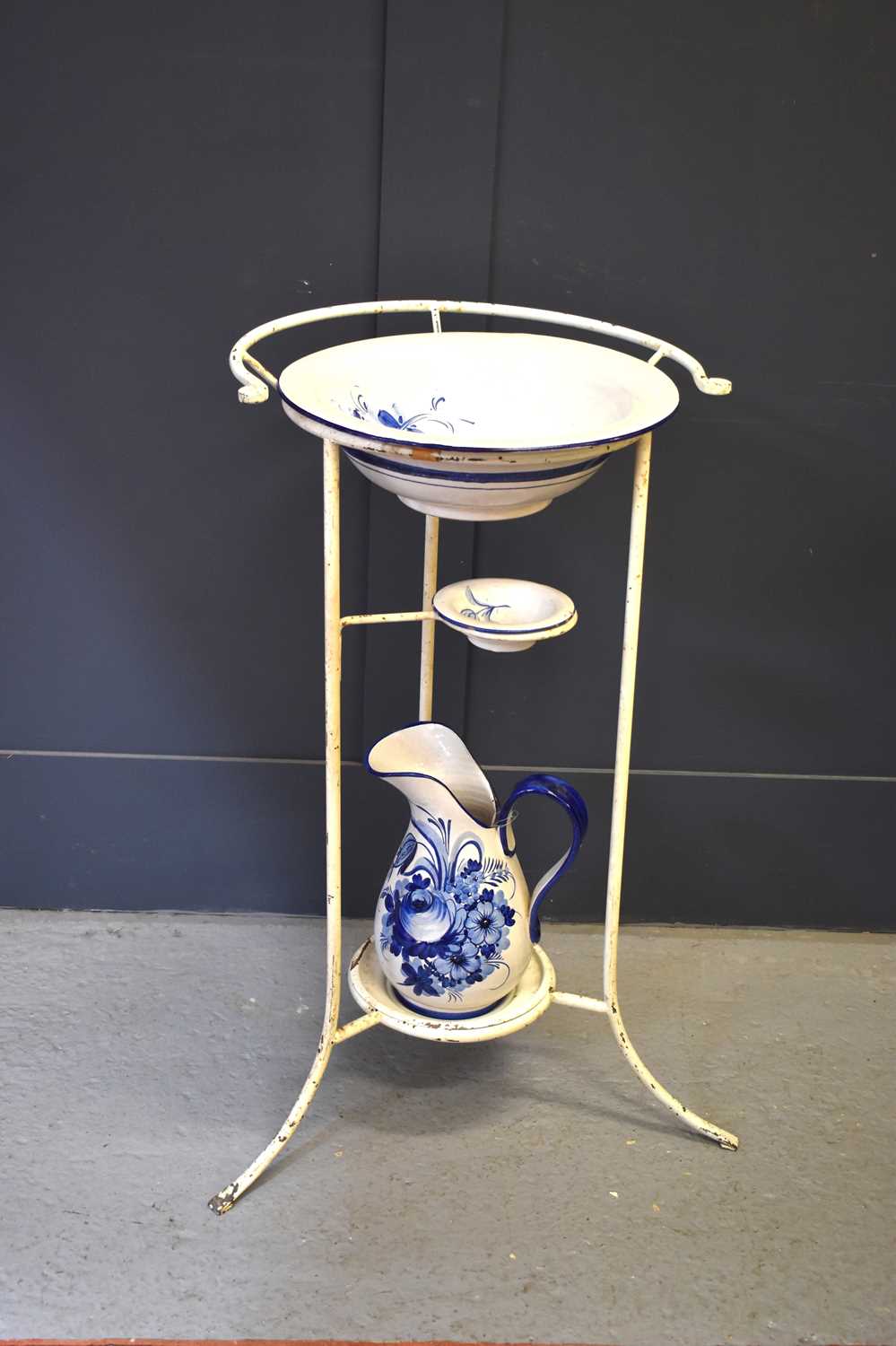 Lot 227 - A wrought iron wash stand with bowl and jug,...