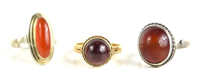 Lot 226 - A 9ct gold [tested as] and garnet cabochon...