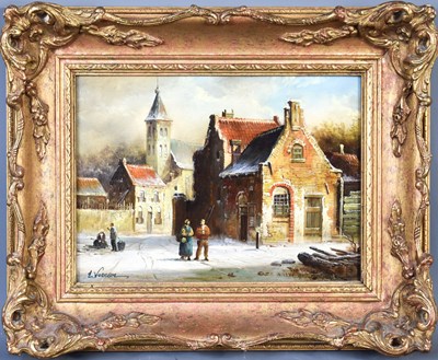 Lot 11 - E Vernon (20th century): Dutch snowy townscape,...