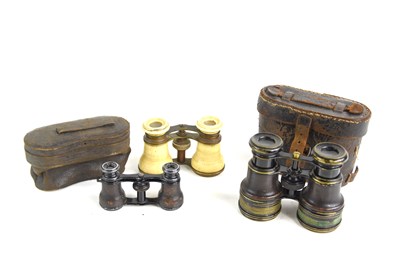 Lot 50 - A pair of early 20th century field glasses by...