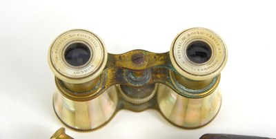Lot 85 - A pair of early 20th century field glasses by...