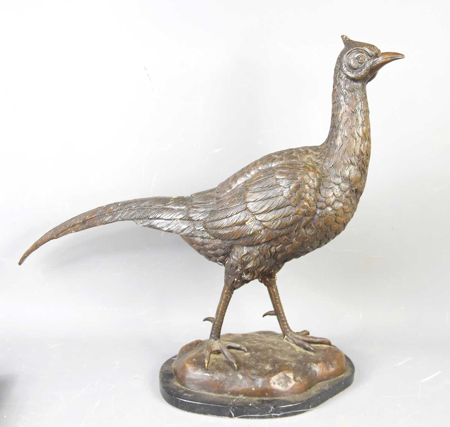 Lot 200 - A 20th century large bronze pheasant, raised...