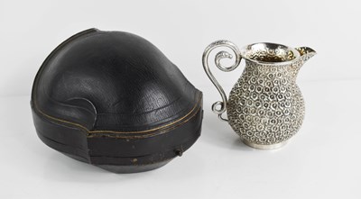 Lot 162 - A continental silver jug chased and repoussed...