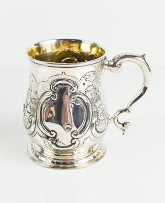 Lot 155 - A Georgian silver tankard, with chased and...