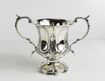 Lot 153 - A Georgian silver twin handled trophy, with...