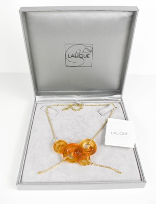 Lot 228 - A Lalique cloud pendant necklace, in the...