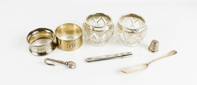 Lot 238 - A group of silver to include thimble, two...