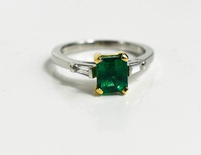 Lot 227 - A platinum and 18ct mounted emerald and...