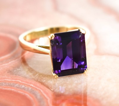 Lot 210 - A 9ct gold and amethyst cocktail ring, the...