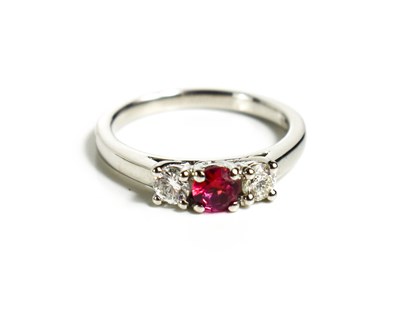 Lot 218 - A platinum, ruby and diamond ring, size K, 4.7g.