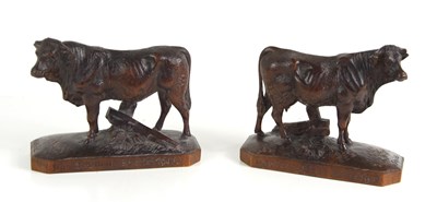 Lot 26 - A pair of finely carved Black Forest cow and...
