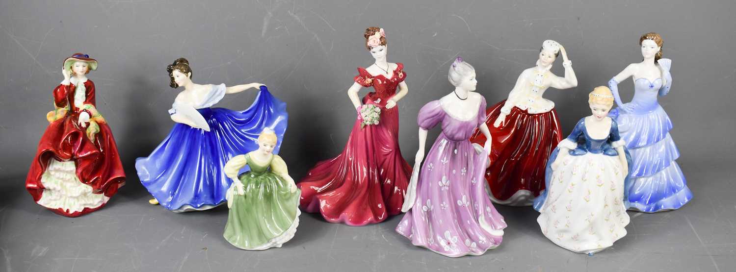 Lot 221 - A group of porcelain lady figurines: Royal...