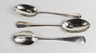 Lot 310 - A set of three Edwardian serving spoons, in...