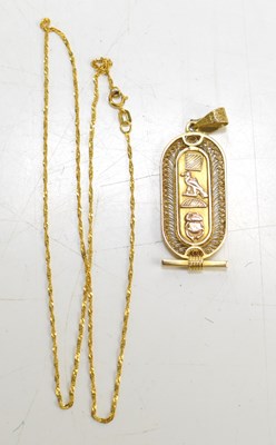 Lot 20 - An Egyptian gold pendant, with central lozenge...