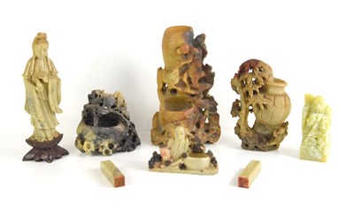 Lot 230 - A group of Chinese soapstone carved figures to...