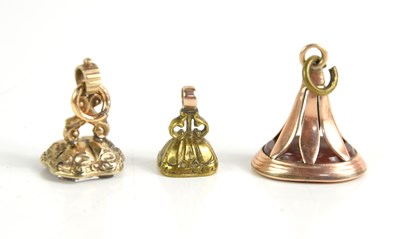 Lot 52 - Three antique fob seal pendants to include an...