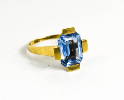 Lot 326 - A 14ct gold and blue topaz dress ring, with...