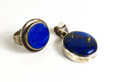 Lot 330 - A silver and lapis lazuli set pendant and...