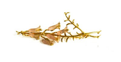 Lot 334 - A gold and rock crystal brooch in the form of...