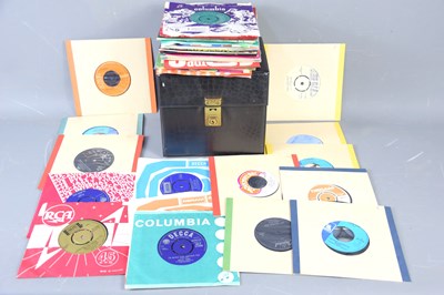 Lot 110 - A group of 7" single records to include Elvis...