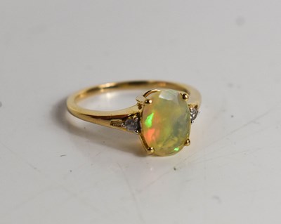 Lot 362 - A 9ct gold, opal and white zircon ring, with...