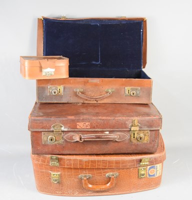 Lot 75 - An antique leather suitcase together with a...