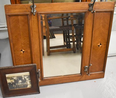 Lot 439 - An Edwardian mahogany coat rack mirror, having...