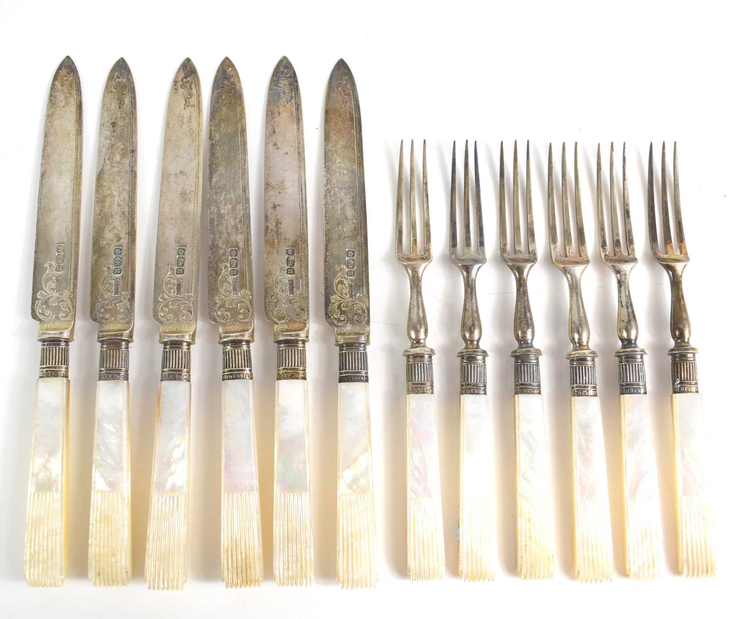Lot 15 - A set of silver fish knives and forks with...