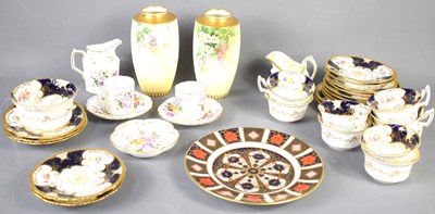 Lot 201 - A Coalport part tea service in the 2668...