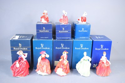 Lot 202 - A group of Royal Doulton figurines to include...