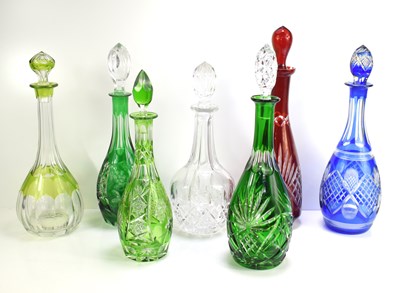 Lot 132 - Seven cut glass decanters of different colours...