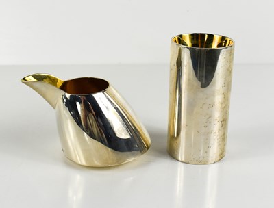 Lot 111 - Barry Thomas, a silver milk jug and a silver...