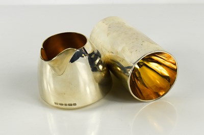 Lot 111 - Barry Thomas, a silver milk jug and a silver...